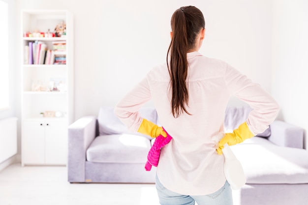Free photo woman cleaning her home