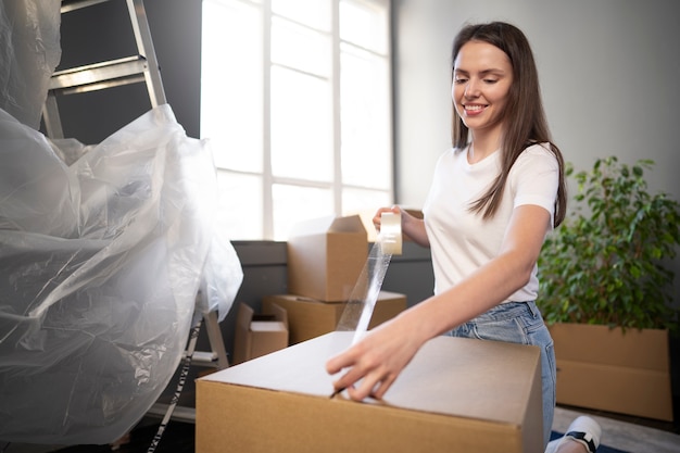 Free photo young adult moving into a new home