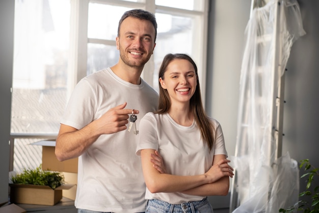 Free photo young family moving into a new home