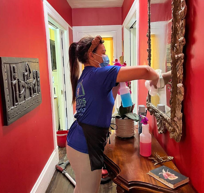 Brabos Cleaning staff member performing deep cleaning in a Boston apartment