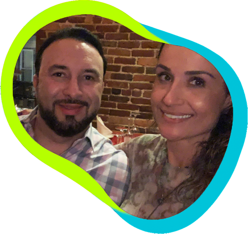 Adriano and Lu, founders of Brabos Cleaning Services, standing together as partners in life and business