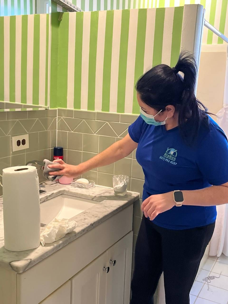 Brabos Cleaning staff member performing a one-time cleaning service in a Boston home