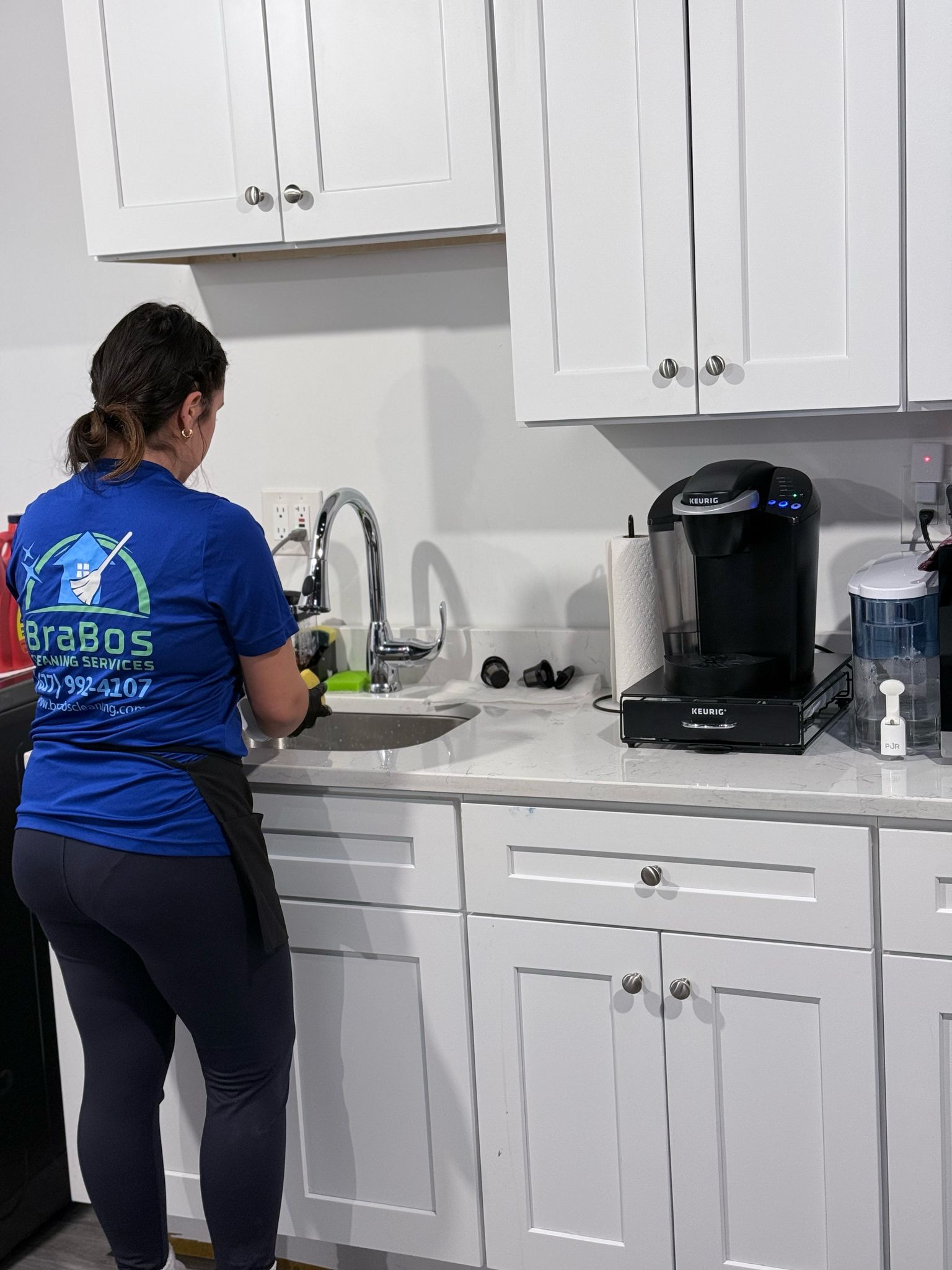 Brabos Cleaning staff performing a move-out cleaning in a Boston home